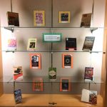 Photo of the Schow display case, filled with books.