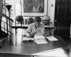Person reading at a table