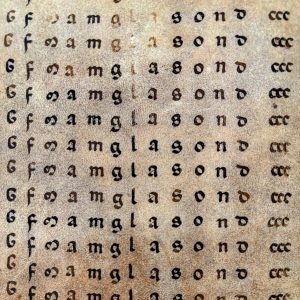 calligraphy practice: a repeated series of letters in rows