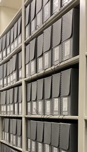 boxes of Sterling Brown correspondence on library shelving